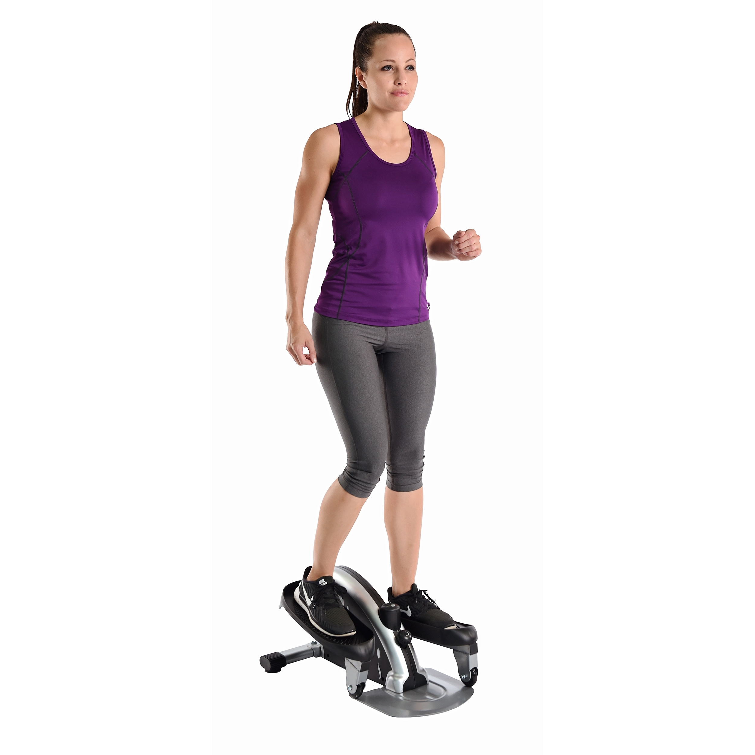 Woman exercising on Stamina InMotion E1000 Compact Strider