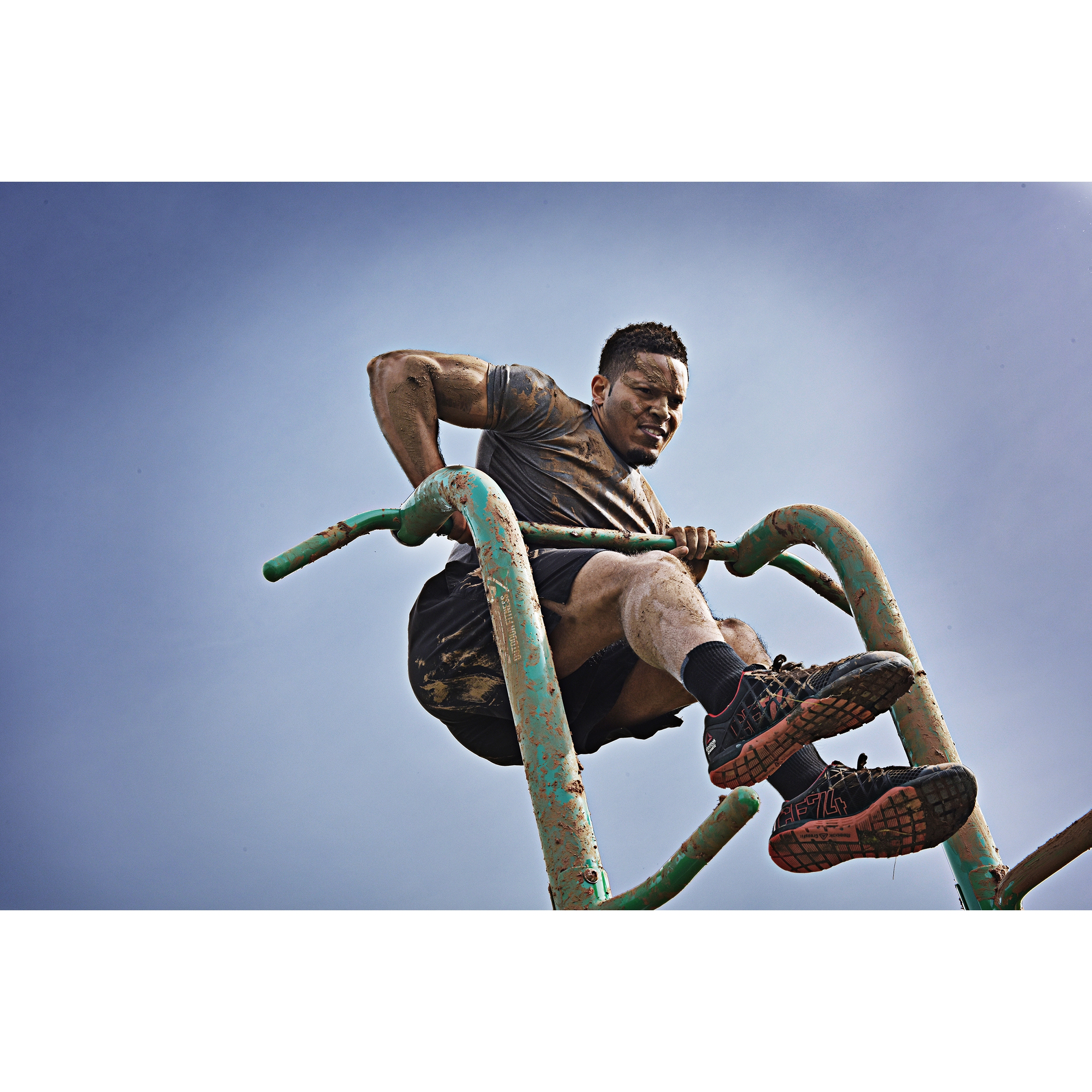 Muddy man workout on Stamina Outdoor Fitness Power Tower