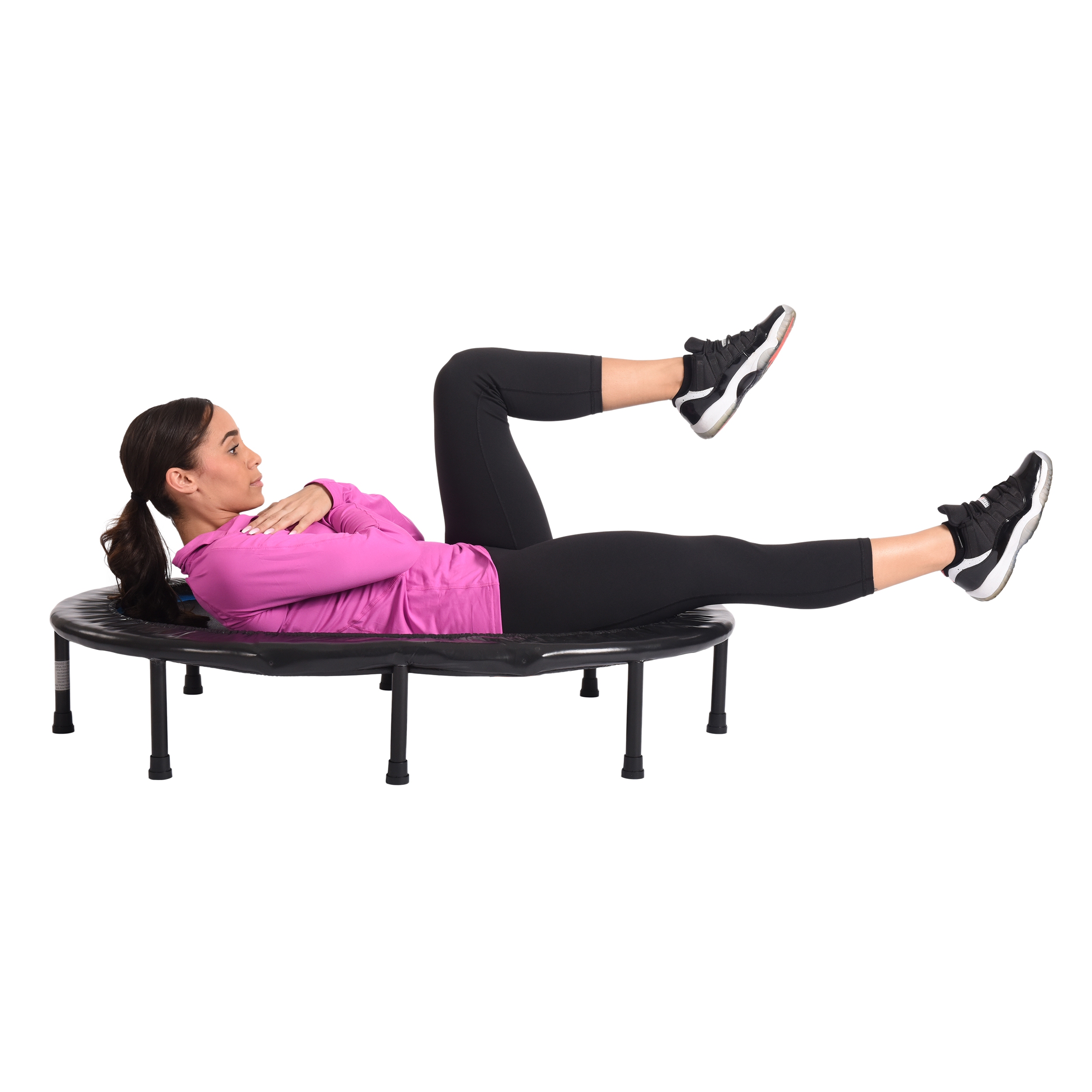 Woman lying on Stamina Intone Rebounder.
