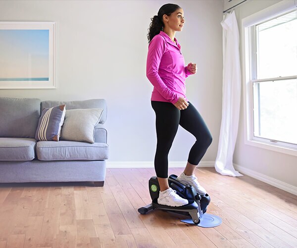 Woman workout on Stamina InMotion Compact Strider