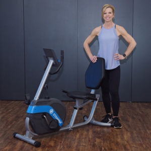 Woman Standing behind on Stamina Recumbent Bike.