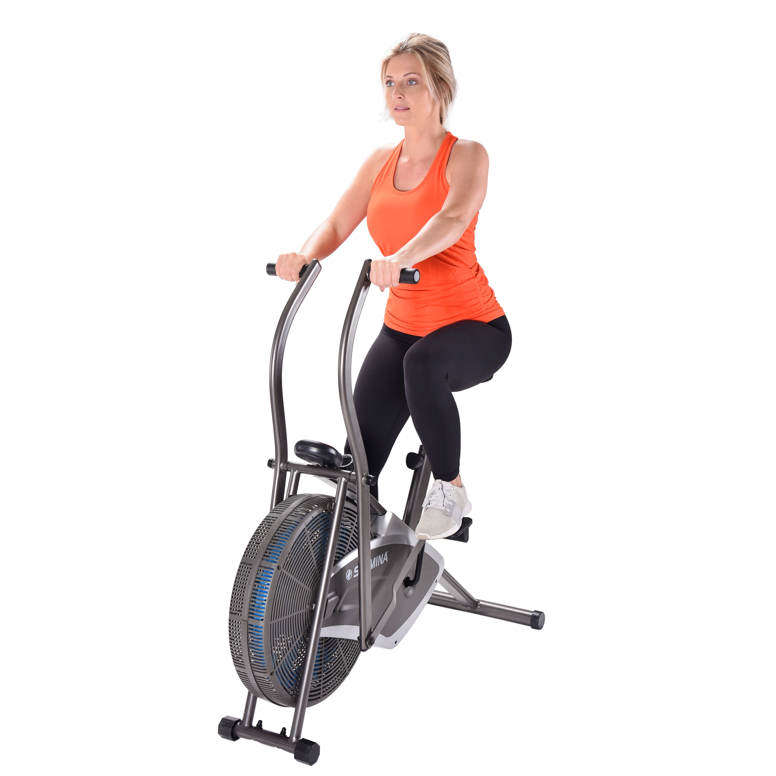 Women cycling on Stamina Air Resistance Bike 876.
