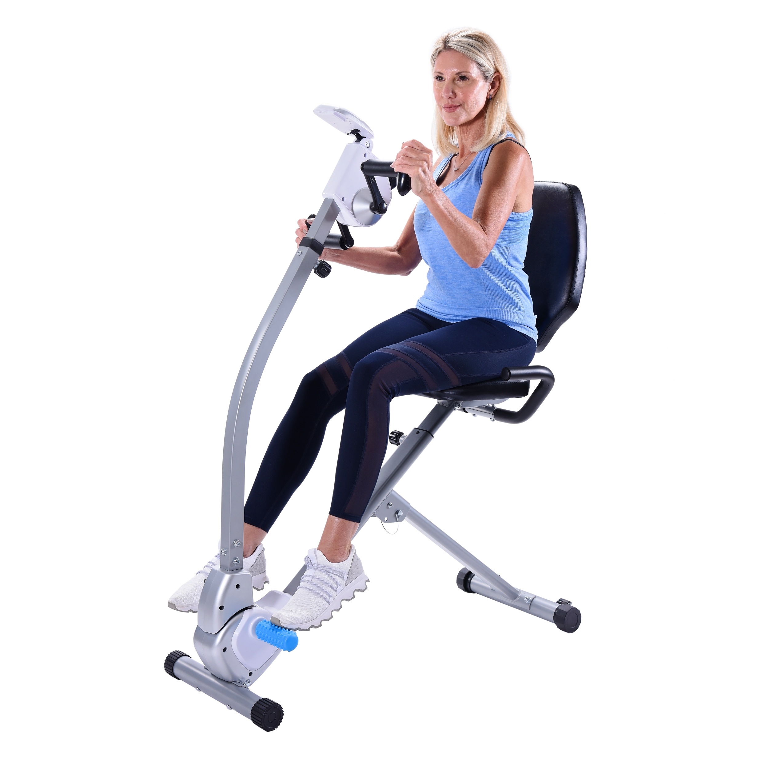 Woman seated on upper exercise bike.