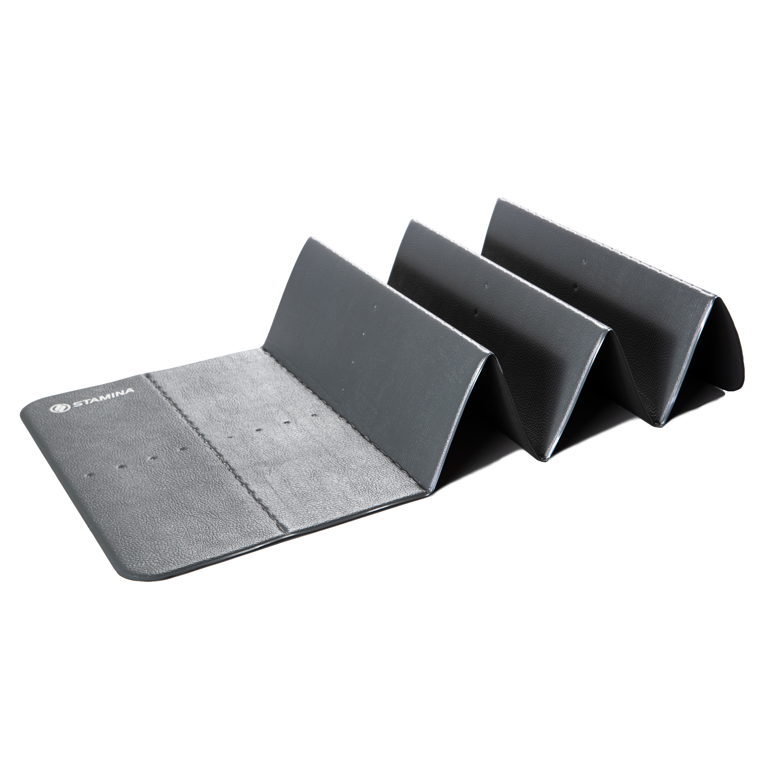 Black exercise mat folded accordion style