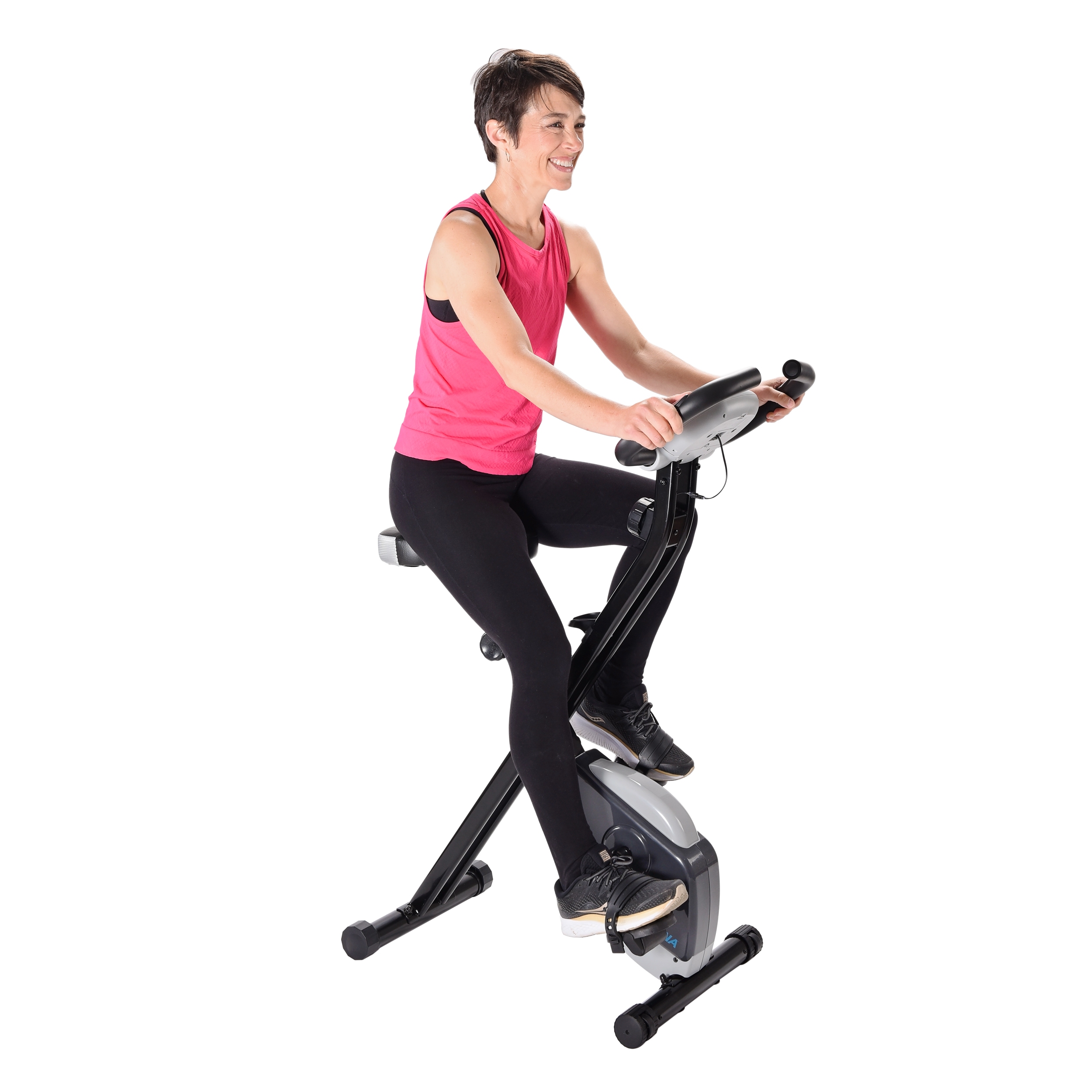Smiling woman cycling on Stamina Folding Exercise Bike 182
